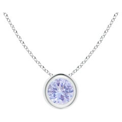Pendentif solitaire en platine serti d'une tanzanite ronde naturelle