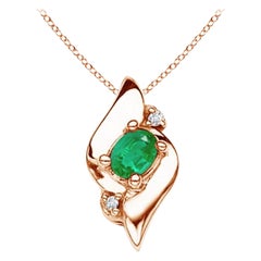 Pendentif de style coquillage naturel, émeraude ovale et diamants en or rose 14 carats