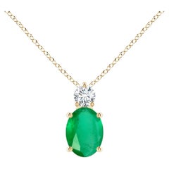 Natural Oval 1.1 ct Emerald Solitaire Pendant with Diamond in 14K Yellow Gold