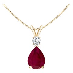 Colgante lágrima de rubí natural de 1,15 ct con diamante en oro amarillo de 14 quilates