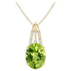 Ciondolo ovale naturale con peridoto e diamante da 1,9 carati in oro giallo 18 carati