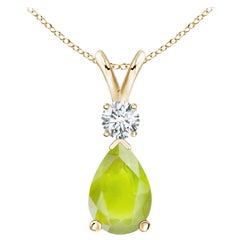 Colgante lágrima de peridoto natural de 1,9 ct con diamante en oro amarillo de 14 quilates