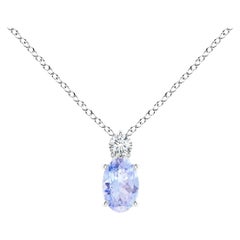 Pendentif solitaire en platine avec tanzanite ovale naturelle et diamants