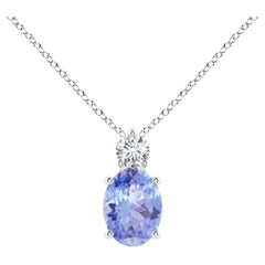 Colgante solitario de tanzanita natural ovalada de 1,25 ct con diamante en oro blanco de 14 quilates