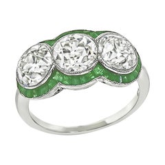 Anello anniversario con diamante smeraldo d'epoca certificato GIA da 3,30cttw
