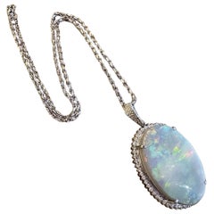 GIA Grey Opal 59.90 carat with Diamond Halo Pendant in Platinum /18k White Gold