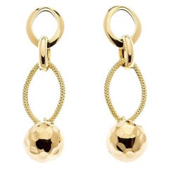 Boucles d'oreilles pendantes en or jaune 18K avec sphère
