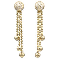 Orecchini con frangia di nappe in oro giallo 18 carati Cartier Draperie Diamond