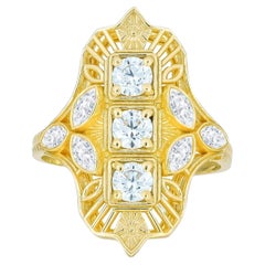 Vintage style moissanite 14k gold engagement ring.