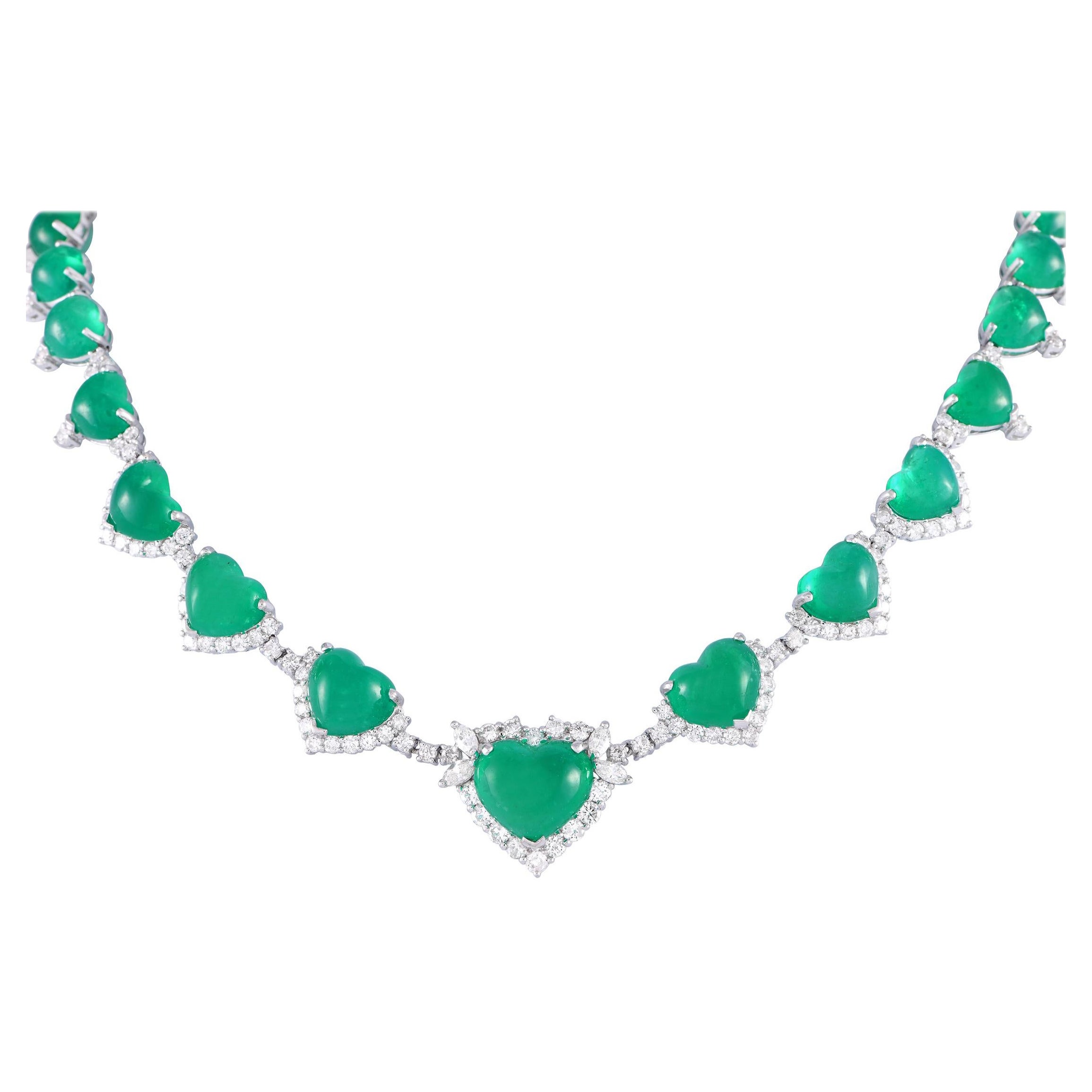 Collier en platine avec cœur de 5,84 carats de diamants et émeraudes