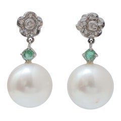 12 Mm White Pearls, Emeralds, Diamonds, Platinum Earrings.