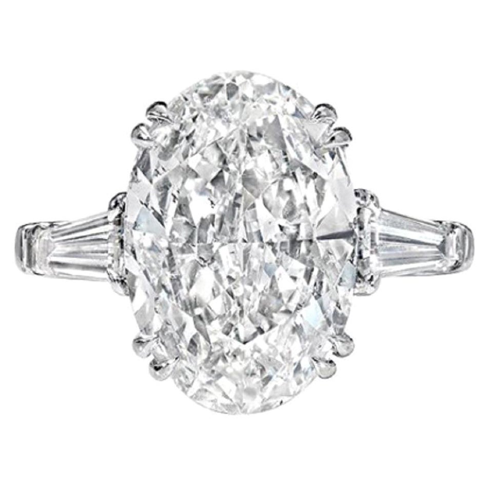 GIA Certified 5.01 Carat Oval Diamond with Tapered Baguette in 18K White Gold