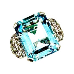 Retro 21.67 Carats Emerald Cut Aquamarine and Diamond Platinum Cocktail Ring