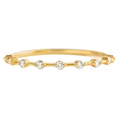 Half eternity moissanite 14k gold ring.