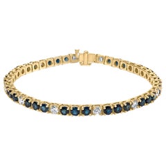 Tennisarmband aus 18 Karat Gelbgold mit abwechselnd 1 1/5 Karat Gesamtkaratgewicht Diamant und blauem Saphir