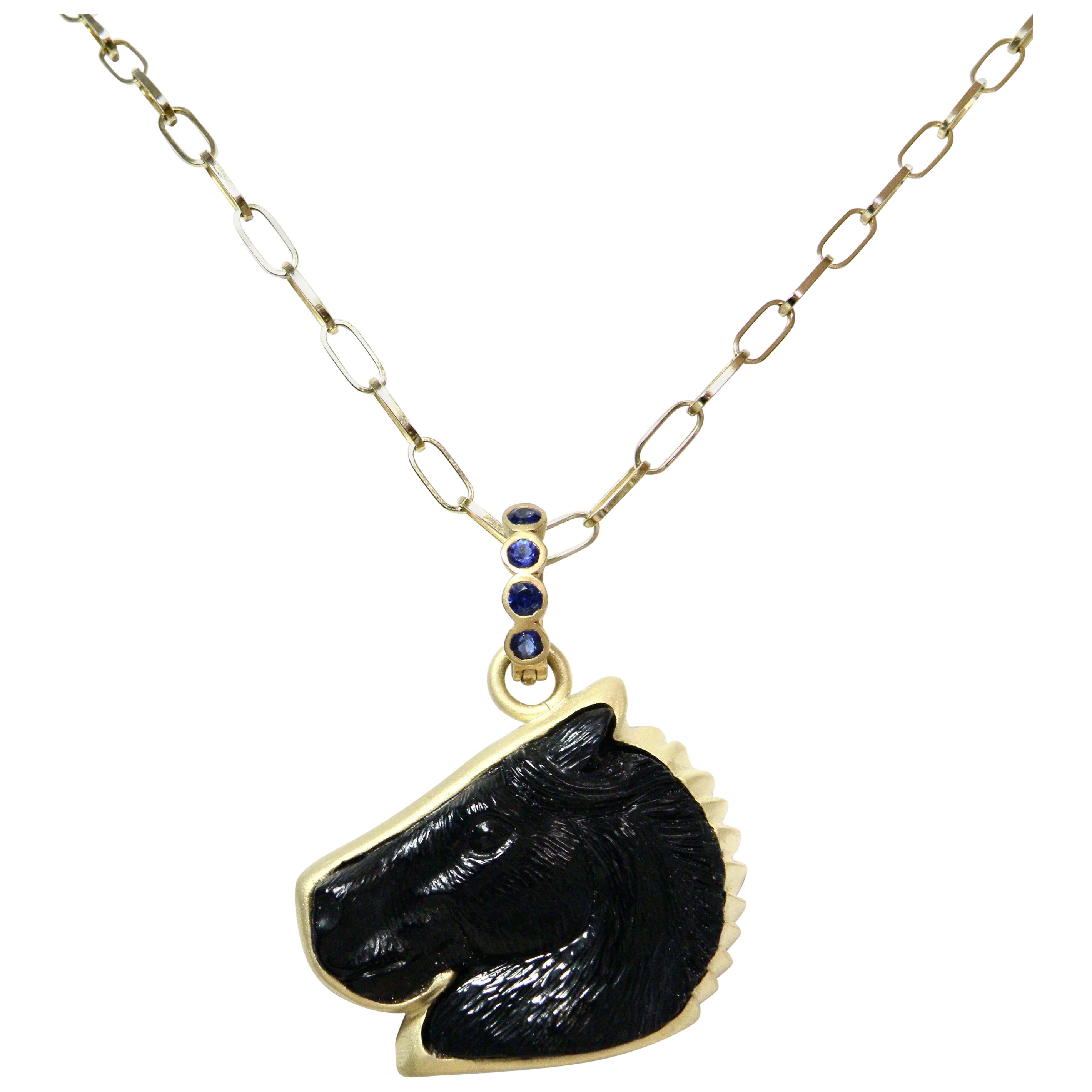 18k enhancer, carved black onyx horse head, sapphire bail For Sale