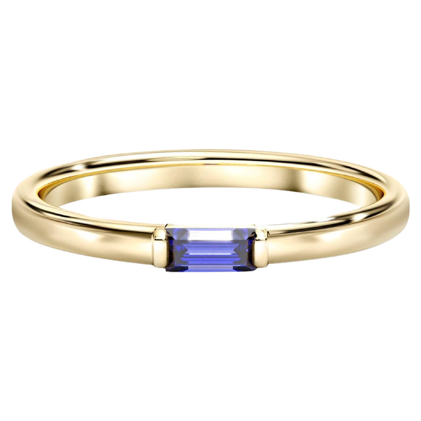 Baguette lab sapphire 14k gold ring.
