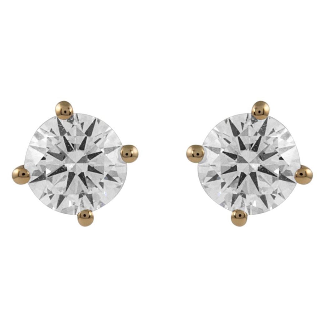 Pendientes de oro amarillo de 18k con un diamante redondo de 1,03 ct