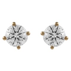 Pendientes de oro amarillo de 18k con un diamante redondo de 1,03 ct