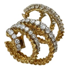 Paire de boucles d'oreilles triple en or 18 carats