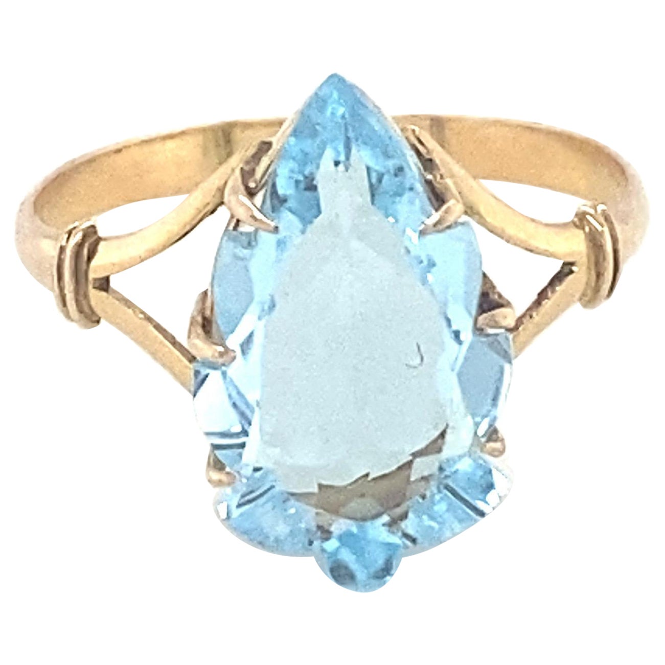 Pear Cut Blue Topaz Yellow Gold Solitaire Ring