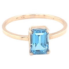 Baguette Cut Blue Topaz Yellow Gold Solitaire Ring