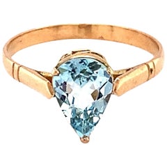 Bague solitaire en or jaune avec aigue-marine taillée en poire