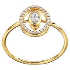 Bezel set marquise moissanite 14k gold ring.