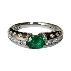 Set in 18K Gold, 1.32 carats, natural Zambian Emerald & Diamonds Engagement Ring