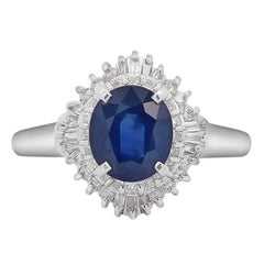 2.8 Carat Oval Blue Sapphire and Diamond Ballerina Halo Ring