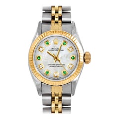 Rolex Montre Oyster Perpetual pour femmes avec cadran en émeraude, nacre et diamant