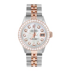 Rolex Montre Datejust MOP pour femmes avec cadran en or rose et lunette en diamants