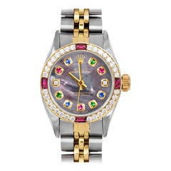 Rolex Lady Oyster Perpetual Tahitian Rainbow Diamond Dial Ruby Diamond Bezel