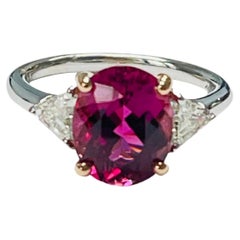Pink Tourmaline And Diamond Three Stone Engagement Ring In White Gold.