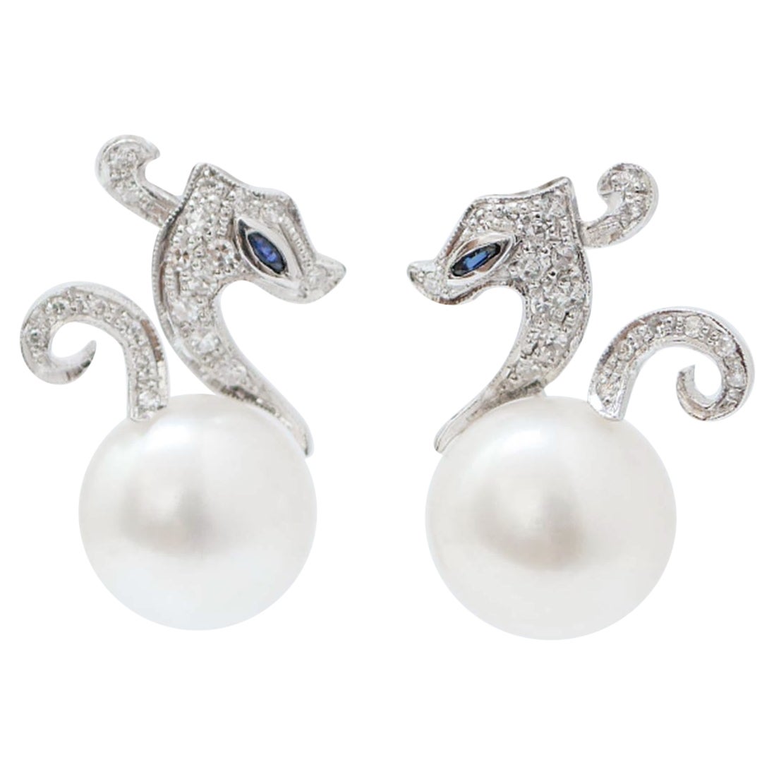 White Pearls, Sapphires, Diamonds, Platinum Horse Earrings.