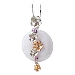 Colgante Donut de Jade Natural de Myanmar Tono Lavanda en Oro Bicolor de 14K