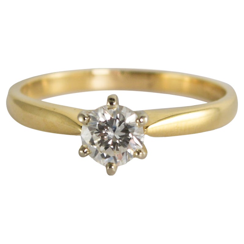 Anillo solitario de diamantes de oro amarillo de 18 quilates 0,50 ct