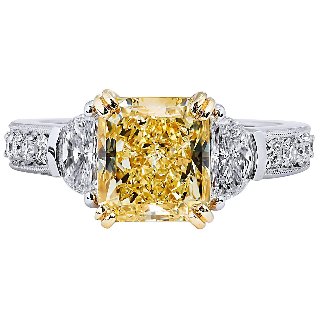 GIA Certified 3.17 Carat Fancy Yellow and Half Moon-Shaped Diamond Ring For Sale
