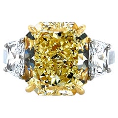 GIA Certified 7.28 Carat Natural Fancy Yellow VVS2 Diamond Plat Engagement Ring