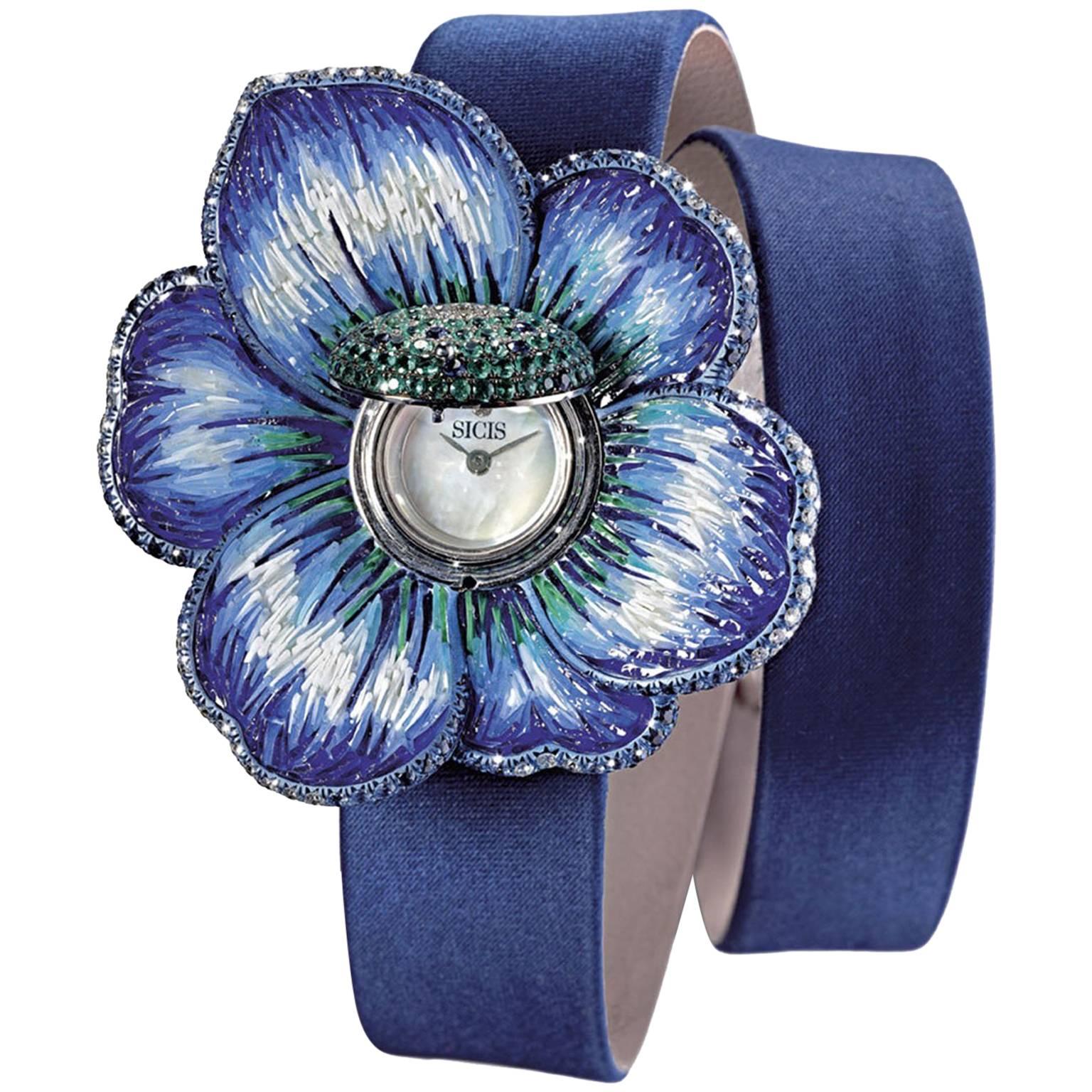 Montre-bracelet élégante à quartz en or blanc, diamant blanc, saphir bleu, émeraude et quartz