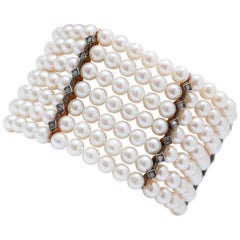 Retrò-Armband aus Perlen, Diamanten, Roségold und Silber.