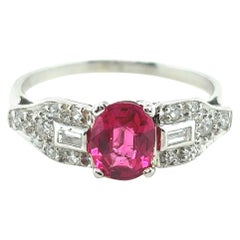 Anello in platino con spinello rosso e diamante da 0,76 carati