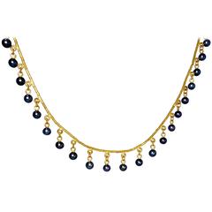 Black pearl and 23K gold necklace, Gurhan
