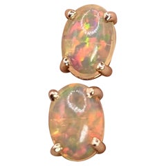 Natural Ethiopian Opal Solitaire Stud Earrings in Solid 14k Gold Oval 7x5mm