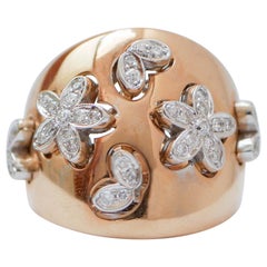 Diamonds, 18 Karat Rose Gold and White Gold Modern Ring.