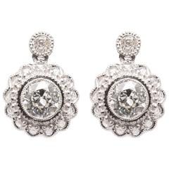 Bezel Set 1.92 Carat European Cut Diamond Earrings in Platinum