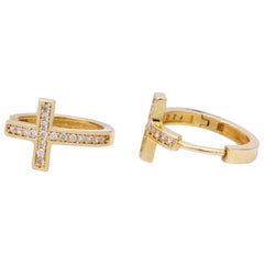 Cruz de diamantes Huggies