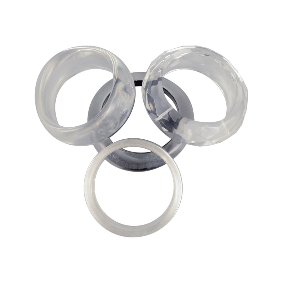 French jewelry designer. Four bracelets in clear plastic. Late 20th C. For Sale