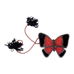 Yves Saint Laurent. Una collana precoce. Stained glass e ghisa.