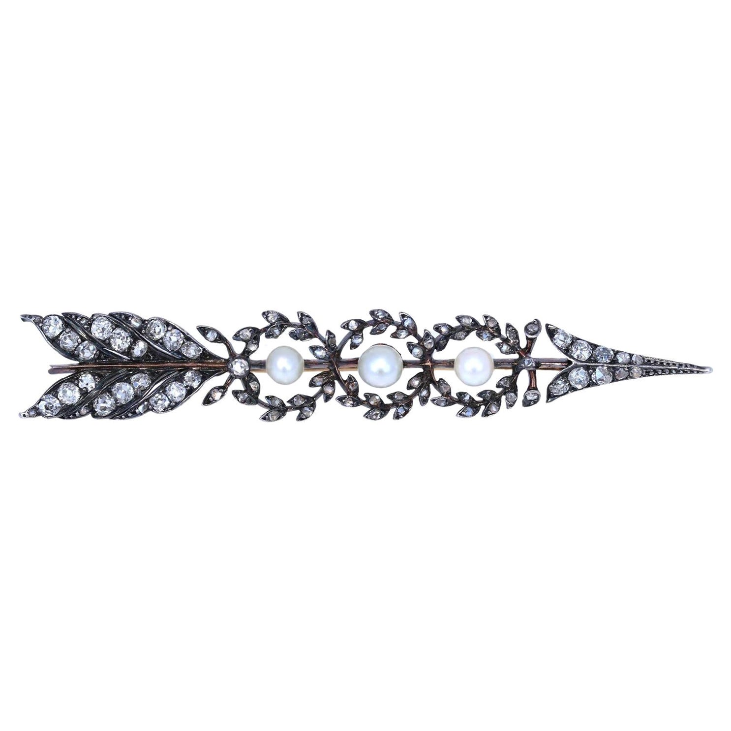 Victorian Gold with Silver Rose-cut Diamonds and Pearls Arrow Brooch. Created around 1895. Presented in the original box. Highly collectable item.

Arrow has been always considered as a sign of love. Once it was common to communicate a message via